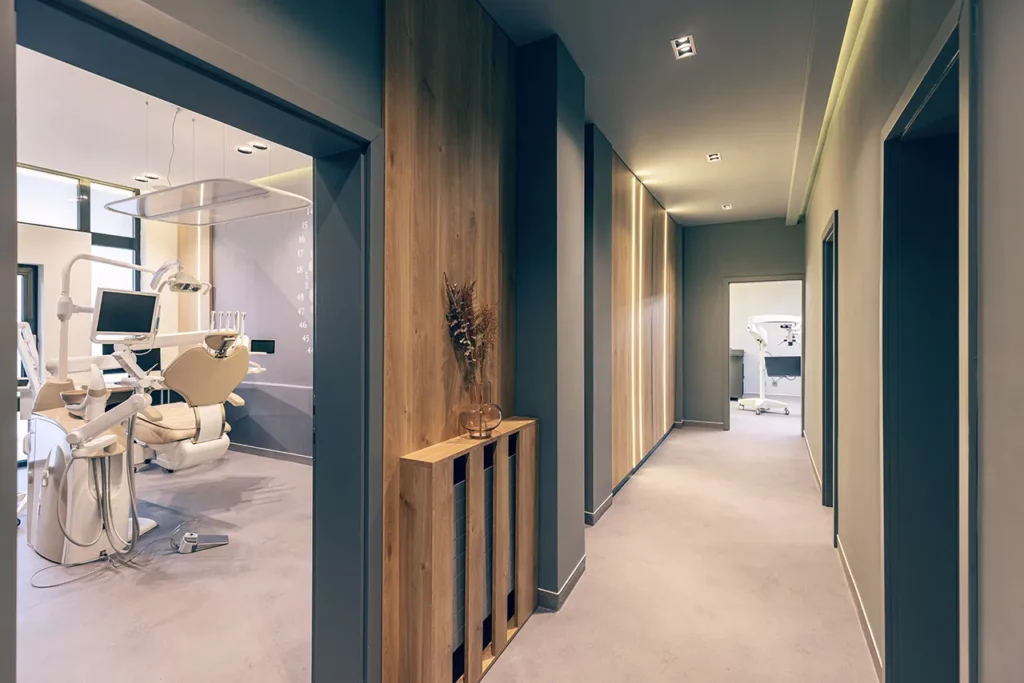 A dentist's office with a wooden floor and wooden walls.